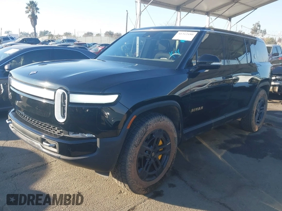 2024 Rivian R1S Adventure with VIN 7PDSGABAXRN034598, listed as a IAAI auction lot 41312180 with 23,615 mi miles. Bid and sale history available at carsss.com. Image 2.