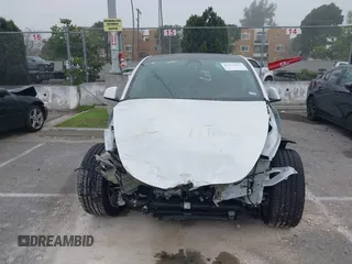 2022 Tesla Model Y Long Range z VIN 7SAYGDEE4NF315356, wystawiony jako IAAI lot #41571151 z przebiegiem 1 056 mil mil oraz . Historia ofert i sprzedaży dostępna na DreamBid. Obrazek 12.