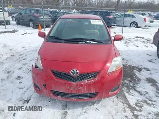 2009 Toyota Yaris with VIN JTDBT903991314767, listed as a IAAI auction lot 41615264 with 252,957 mi miles. Bid and sale history available at carsss.com. Image 12.