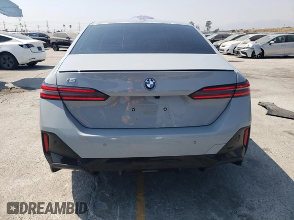 2024 BMW i5 eDrive40 with VIN WBY33FK09RCR17369, listed as a Copart auction lot 65018825 with 3,853 mi miles and Clean title. Bid and sale history available at DreamBid. Image 6.