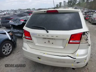 2014 Dodge Journey SE with VIN 3C4PDCABXET135338, listed as a IAAI auction lot 41950088 with 209,944 mi miles. Bid and sale history available at carsss.com. Image 16.