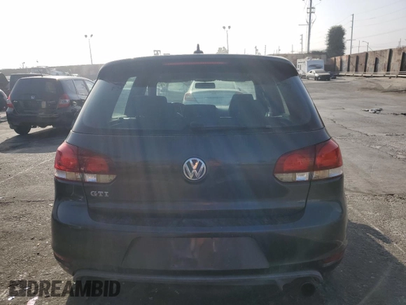 2010 Volkswagen GTI z VIN WVWGV7AJ6AW418495, wystawiony jako Copart lot #84345214 z przebiegiem 120 471 mil mil oraz Czysty tytuł • Clean title. Historia ofert i sprzedaży dostępna na DreamBid. Obrazek 6.