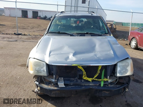 2004 GMC Envoy SLT with VIN 1GKDT13S742133932, listed as a IAAI auction lot 41598339 with 168,651 mi miles and . Bid and sale history available at DreamBid. Image 12.