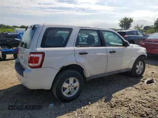 2009 Ford Escape XLS z VIN 1FMCU02779KB08396, wystawiony jako Copart lot #80984104 z przebiegiem 194 743 mil mil oraz Szkoda całkowita • Salvage title. Historia ofert i sprzedaży dostępna na DreamBid. Obrazek 3.