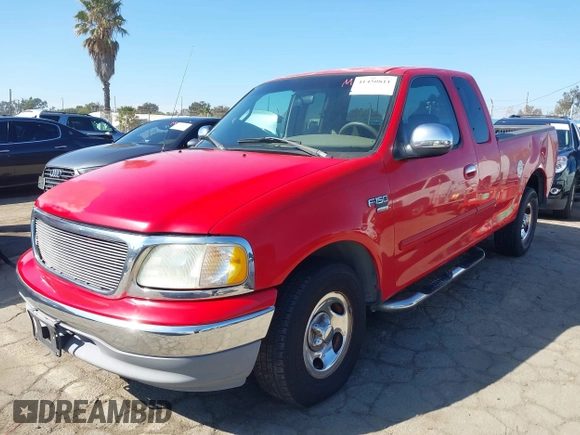 2002 Ford F-150 XL with VIN 1FTRX17W52NA81828, listed as a IAAI auction lot 41450811 with 201,948 mi miles. Bid and sale history available at carsss.com. Image 17.