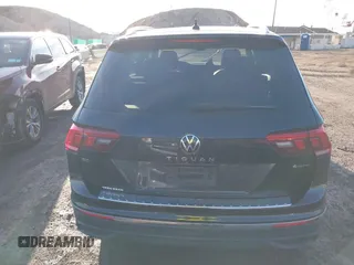 2023 Volkswagen Tiguan SE with VIN 3VVMB7AX8PM032557, listed as a IAAI auction lot 41585975 with 28,706 mi miles and . Bid and sale history available at DreamBid. Image 16.