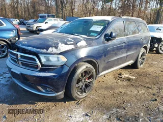 2014 Dodge Durango SXT with VIN 1C4RDHAG5EC369951, listed as a IAAI auction lot 41278358 with 214,453 mi miles and . Bid and sale history available at carsss.com. Image 18.