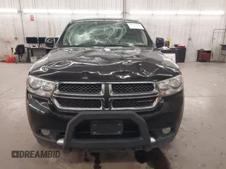 2013 Dodge Durango SXT with VIN 1C4RDJAG0DC512293, listed as a IAAI auction lot 41875919 with 191,128 mi miles and . Bid and sale history available at DreamBid. Image 13.