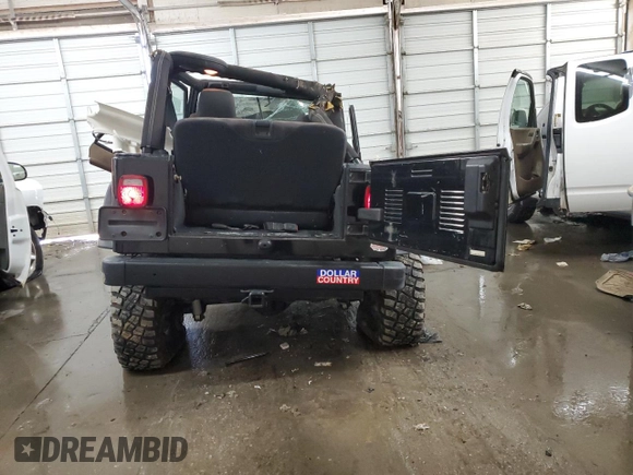 2003 Jeep Wrangler Rubicon with VIN 1J4FA69S13P337927, listed as a Copart auction lot 46179675 with 125,426 mi miles and Non repairable. Bid and sale history available at DreamBid. Image 6.