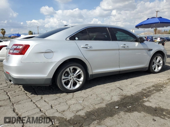 2015 Ford Taurus SEL with VIN 1FAHP2E88FG121647, listed as a Copart auction lot 51660585 with 155,686 mi miles and Clean Title. Bid and sale history available at DreamBid. Image 3.