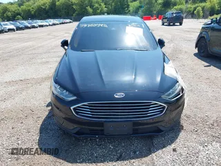 2020 Ford Fusion SE with VIN 3FA6P0HD6LR101129, listed as a IAAI auction lot 39737792 with 18,315 mi miles and . Bid and sale history available at DreamBid. Image 12.