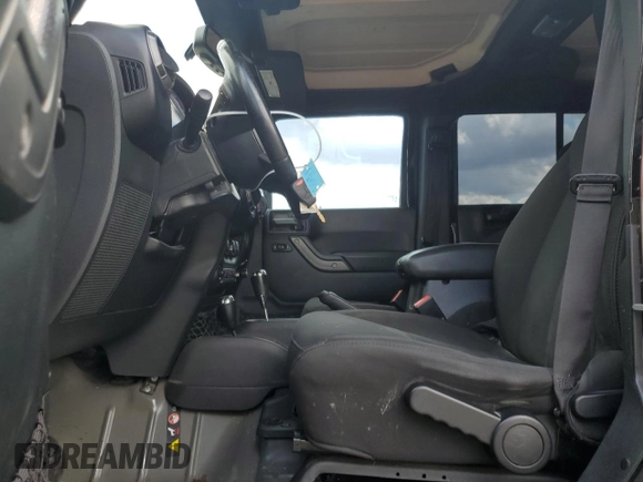 2017 Jeep Wrangler Unlimited Sport with VIN 1C4HJWDG0HL601932, listed as a Copart auction lot 56894835 with 178,525 mi miles and Salvage title. Bid and sale history available at DreamBid. Image 7.