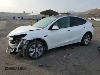 2023 Tesla Model Y Long Range with VIN 7SAYGDEE5PA125887, listed as a Copart auction lot 43188655 with 31,472 mi miles and Salvage Title. Bid and sale history available at DreamBid. Image 1.