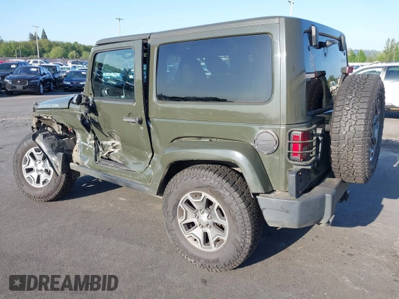 2015 Jeep Wrangler Rubicon Hard Rock with VIN 1C4BJWCGXFL771669, listed as a IAAI auction lot 42057423 with 36,996 mi miles and . Bid and sale history available at DreamBid. Image 3.