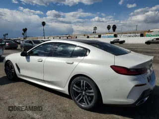 2023 BMW 8 Series 840i with VIN WBAGV4C01PCL65666, listed as a Copart auction lot 47543754 with 31,703 mi miles. Bid and sale history available at carsss.com. Image 2.