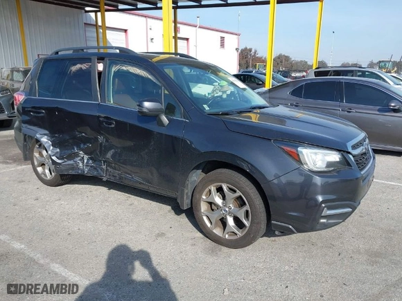 2018 Subaru Forester Touring with VIN JF2SJAWC7JH441559, listed as a IAAI auction lot 41599025 with 105,828 mi miles. Bid and sale history available at carsss.com. Image 1.