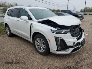 2021 Cadillac XT6 Luxury z VIN 1GYKPAR46MZ132157, wystawiony jako Copart lot #83911054 z przebiegiem 59 473 mil mil oraz Czysty tytuł • Clean title. Historia ofert i sprzedaży dostępna na DreamBid. Obrazek 4.