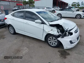 2015 Hyundai Accent GLS with VIN KMHCT4AE9FU808981, listed as a IAAI auction lot 41930246 with 160,406 mi miles. Bid and sale history available at carsss.com. Image 1.