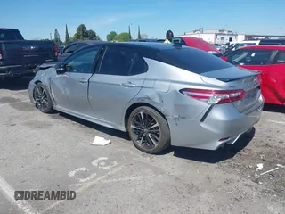2020 Toyota Camry XSE with VIN 4T1K61AK1LU318098, listed as a IAAI auction lot 41838182 with 64,118 mi miles and . Bid and sale history available at DreamBid. Image 3.