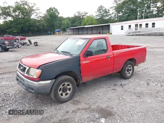 1999 Nissan Frontier XE with VIN 1N6DD21S8XC324434, listed as a IAAI auction lot 42580242 with 322,016 mi miles and . Bid and sale history available at DreamBid. Image 2.