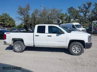 2019 Chevrolet Silverado 1500 LD Work Truck with VIN 2GCVKNECXK1121058, listed as a IAAI auction lot 41707096 with 144,416 mi miles. Bid and sale history available at carsss.com. Image 13.