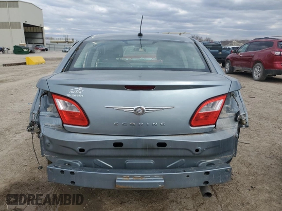 2010 Chrysler Sebring Limited z VIN 1C3CC5FD3AN190722, wystawiony jako Copart lot #48220335 z przebiegiem 201 993 mil mil oraz Szkody całkowita. Historia ofert i sprzedaży dostępna na DreamBid. Obrazek 6.