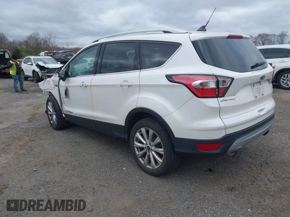 2018 Ford Escape Titanium with VIN 1FMCU9J90JUD53380, listed as a IAAI auction lot 42042802 with 30,371 mi miles and . Bid and sale history available at DreamBid. Image 3.