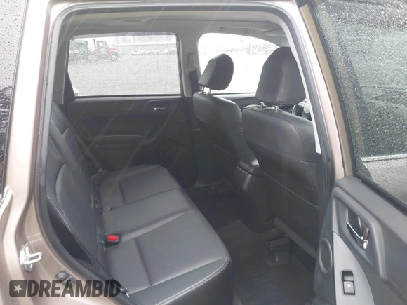 2015 Subaru Forester Touring with VIN JF2SJAUC1FH457069, listed as a IAAI auction lot 42293542 with 71,689 mi miles and . Bid and sale history available at DreamBid. Image 8.