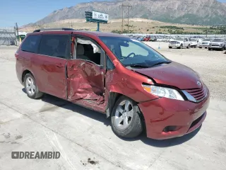 2015 Toyota Sienna LE AAS with VIN 5TDKK3DC2FS604910, listed as a Copart auction lot 59231605 with 118,974 mi miles and Salvage title. Bid and sale history available at DreamBid. Image 4.