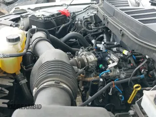 2021 Ford F-150 XL с VIN 1FTEX1CP4MKE07801, выставлен на аукционе IAAI как лот 42577594 с пробегом 101 291 миль миль и . История ставок и продаж доступна на DreamBid. Изображение 19.