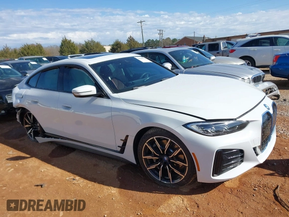 2023 BMW i4 eDrive40 z VIN WBY73AW08PFN72118, wystawiony jako IAAI lot #41849570 z przebiegiem 27 118 mil mil oraz . Historia ofert i sprzedaży dostępna na DreamBid. Obrazek 14.
