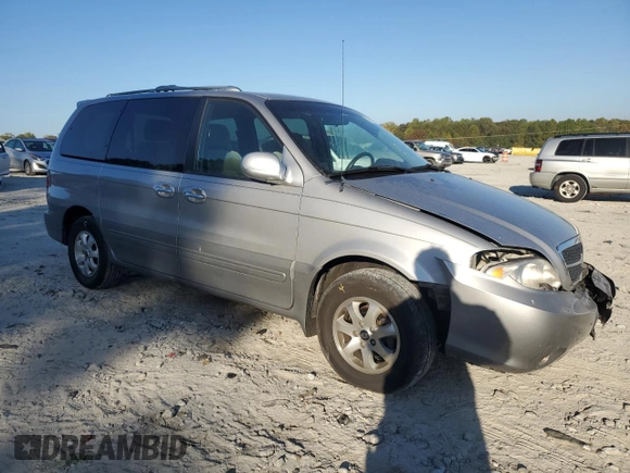 2004 Kia Sedona LX with VIN KNDUP131346508490, listed as a Copart auction lot 77391594 with 41,211 mi miles and Salvage Title. Bid and sale history available at carsss.com. Image 4.