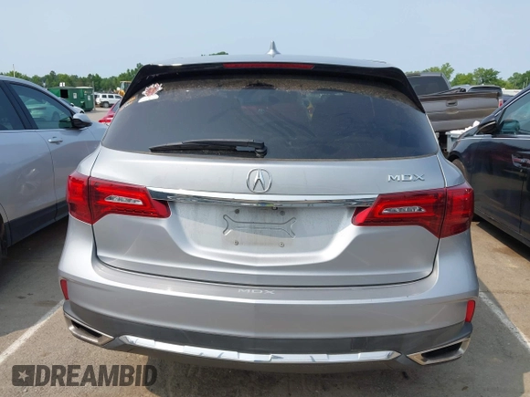2020 Acura MDX with VIN 5J8YD3H39LL016466, listed as a IAAI auction lot 42376611 with 74,873 mi miles and . Bid and sale history available at DreamBid. Image 16.
