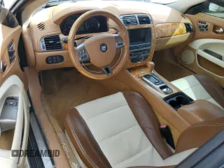 2007 Jaguar XK with VIN SAJDA44B775B05606, listed as a Copart auction lot 49419515 with 115,607 mi miles and Salvage Title. Bid and sale history available at DreamBid. Image 8.
