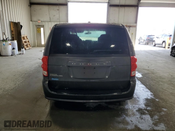 2014 Dodge Grand Caravan SE with VIN 2C4RDGBG6ER463529, listed as a Copart auction lot 51830695 with 105,675 mi miles and Salvage Title. Bid and sale history available at DreamBid. Image 6.