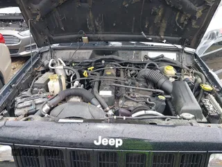 2000 Jeep Cherokee z VIN 1J4FF48S8YL216995, wystawiony jako IAAI lot #42126841 z przebiegiem 178 000 mil mil oraz . Historia ofert i sprzedaży dostępna na DreamBid. Obrazek 10.