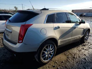 2014 Cadillac SRX Premium Collection z VIN 3GYFNGE34ES687663, wystawiony jako Copart lot #85854534 z przebiegiem 193 653 mil mil oraz Szkody całkowita. Historia ofert i sprzedaży dostępna na DreamBid. Obrazek 3.