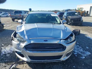 2015 Ford Fusion S with VIN 3FA6P0G77FR135015, listed as a IAAI auction lot 41399694 with 132,175 mi miles. Bid and sale history available at carsss.com. Image 12.