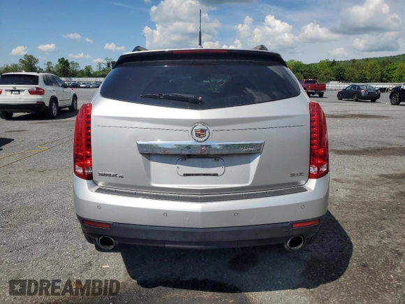 2014 Cadillac SRX Luxury Collection z VIN 3GYFNEE37ES630832, wystawiony jako Copart lot #56335035 z przebiegiem 102 076 mil mil oraz Szkody całkowita. Historia ofert i sprzedaży dostępna na DreamBid. Obrazek 6.