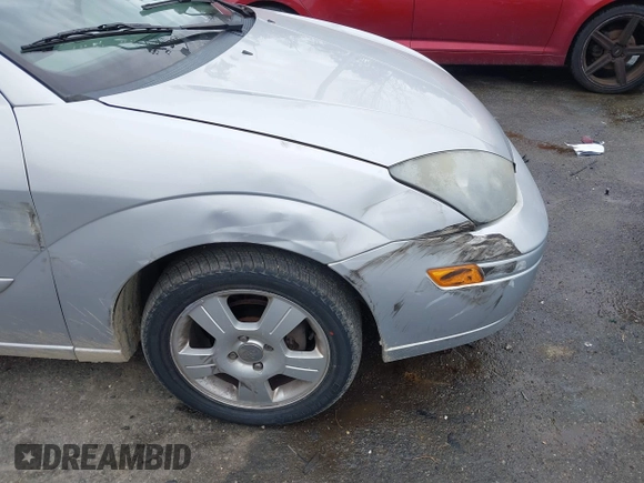 2004 Ford Focus ZTW z VIN 1FAFP35Z44W111027, wystawiony jako IAAI lot #41762414 z przebiegiem 155 535 mil mil oraz . Historia ofert i sprzedaży dostępna na DreamBid. Obrazek 13.
