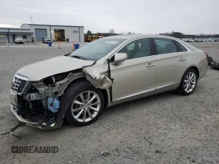 2014 Cadillac XTS Premium with VIN 2G61P5S32E9195930, listed as a Copart auction lot 48320165 with 31,026 mi miles and Salvage Title. Bid and sale history available at carsss.com. Image 1.