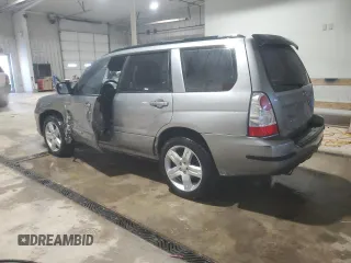 2007 Subaru Forester Sports XT with VIN JF1SG696X7H725959, listed as a Copart auction lot 86597334 with 56,997 mi miles and Salvage Title. Bid and sale history available at carsss.com. Image 2.