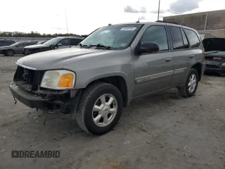 2005 GMC Envoy SLT with VIN 1GKDT13S952155528, listed as a Copart auction lot 76095784 with 212,458 mi miles and Clean Title. Bid and sale history available at carsss.com. Image 1.