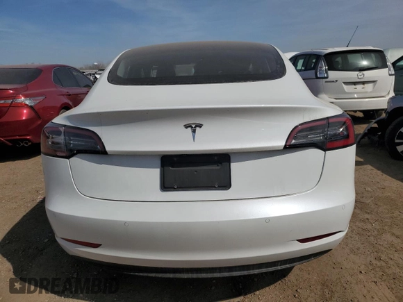 2021 Tesla Model 3 Standard Range Plus z VIN 5YJ3E1EA6MF059194, wystawiony jako Copart lot #53483595 z przebiegiem 22 072 mil mil oraz Szkody całkowita. Historia ofert i sprzedaży dostępna na DreamBid. Obrazek 6.