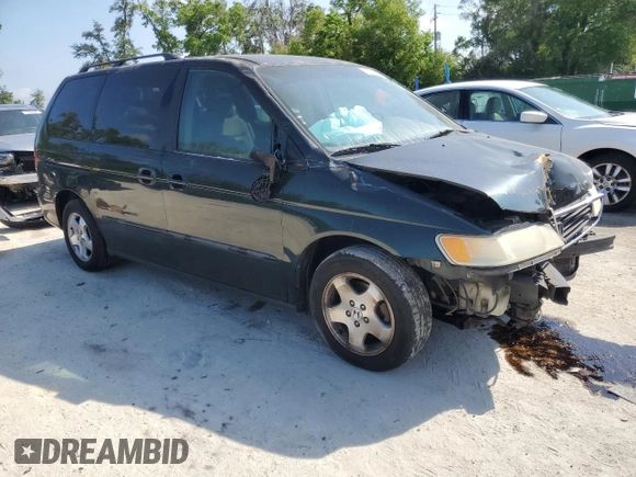 2000 Honda Odyssey EX with VIN 2HKRL1860YH599624, listed as a Copart auction lot 51588625 with Not Provided miles and Salvage Title. Bid and sale history available at DreamBid. Image 4.