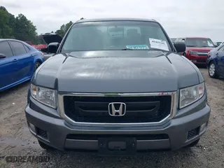 2010 Honda Ridgeline RT with VIN 5FPYK1F28AB010815, listed as a IAAI auction lot 40405105 with 275,762 mi miles. Bid and sale history available at carsss.com. Image 12.