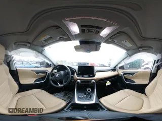 2023 Toyota RAV4 Hybrid XLE Premium with VIN JTMB6RFV4PD114763, listed as a IAAI auction lot 41766812 with 6,768 mi miles. Bid and sale history available at carsss.com. Image 19.