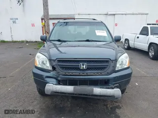 2004 Honda Pilot EX with VIN 2HKYF18444H583826, listed as a IAAI auction lot 41812601 with 196,846 mi miles. Bid and sale history available at carsss.com. Image 12.