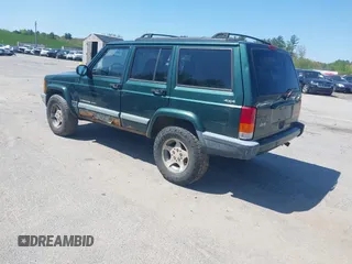 2000 Jeep Cherokee z VIN 1J4FF48S2YL253251, wystawiony jako IAAI lot #42243268 z przebiegiem 154 136 mil mil oraz . Historia ofert i sprzedaży dostępna na DreamBid. Obrazek 3.