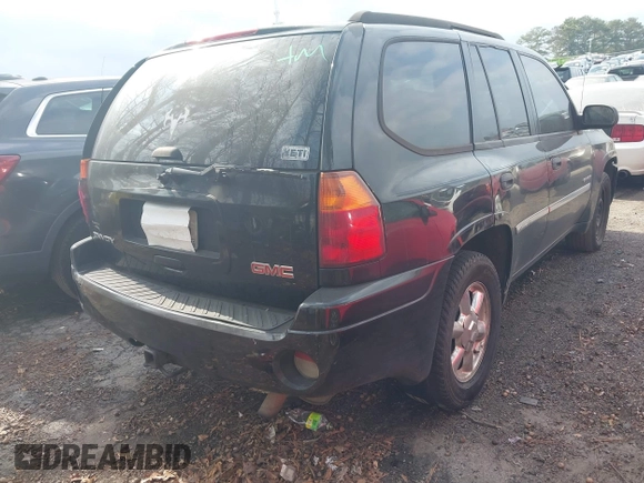 2006 GMC Envoy SLT with VIN 1GKDS13S562199496, listed as a IAAI auction lot 41463065 with 219,473 mi miles. Bid and sale history available at carsss.com. Image 4.
